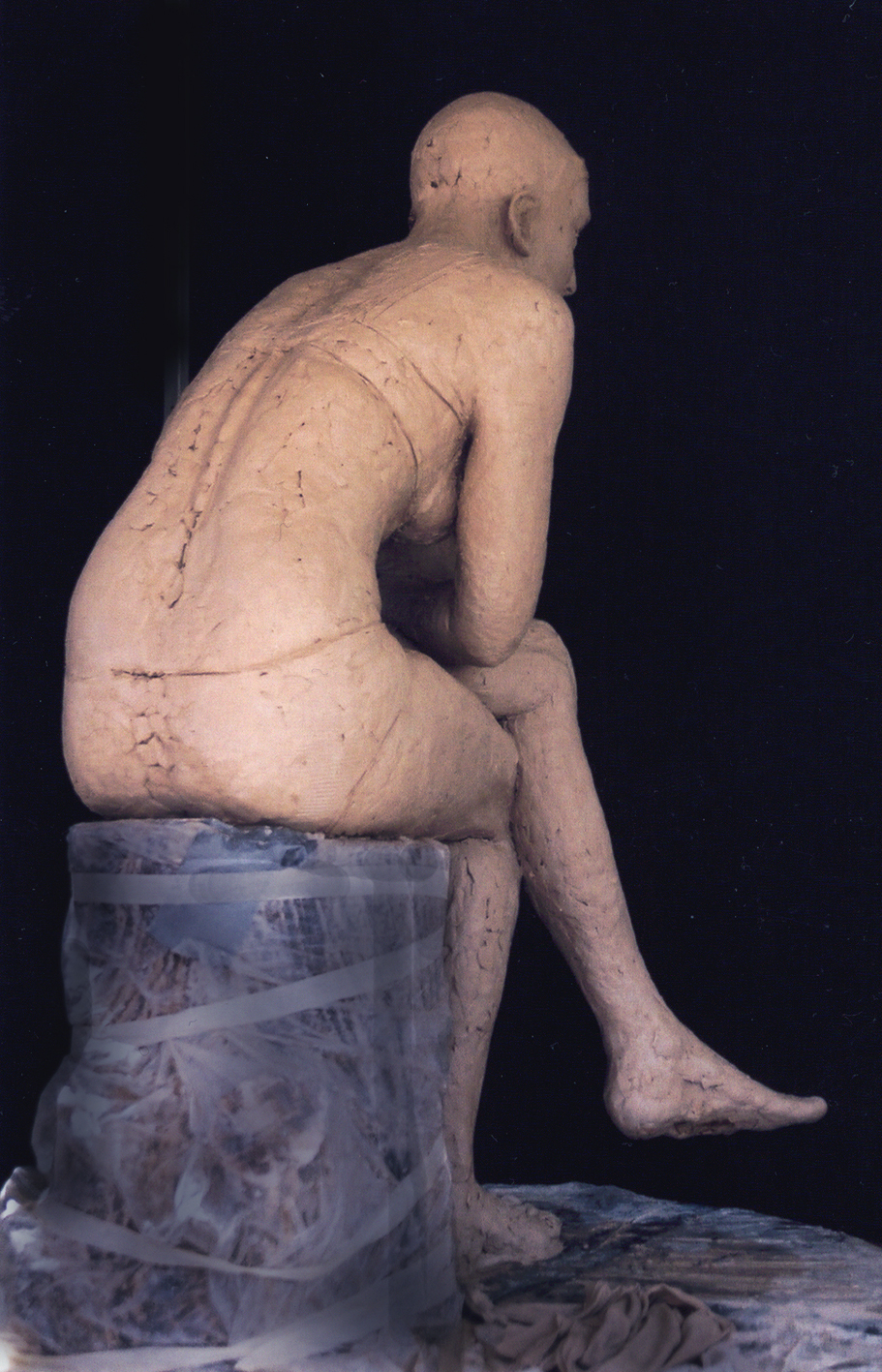 Seated teenager, clay, 2004